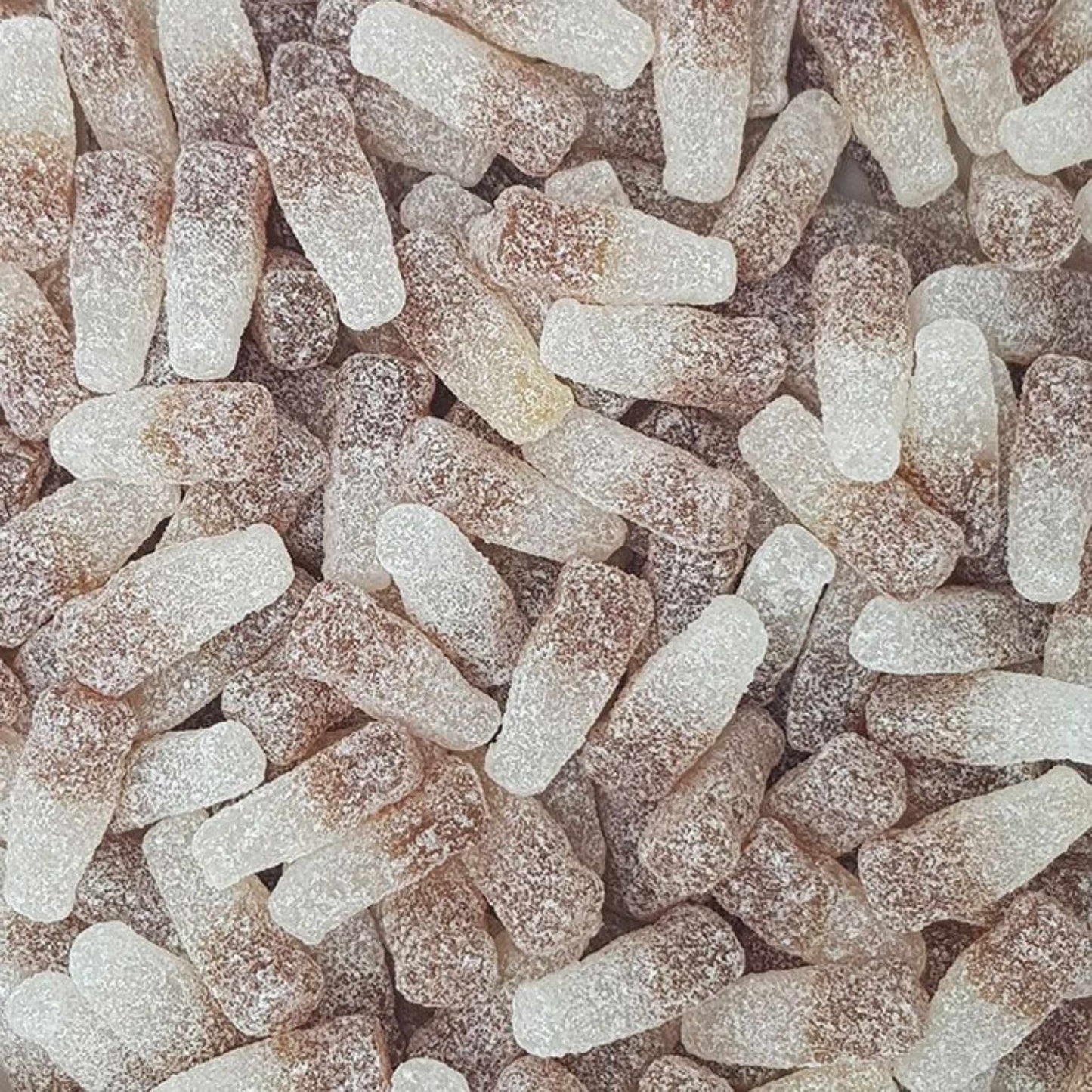 Close-up of fizzy cola bottles