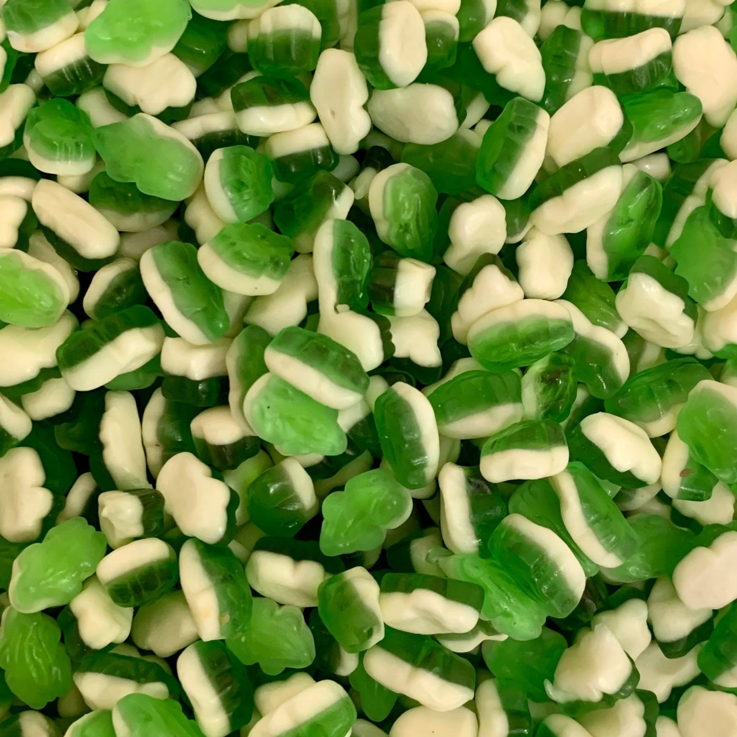 Close-up of green and white candy pieces