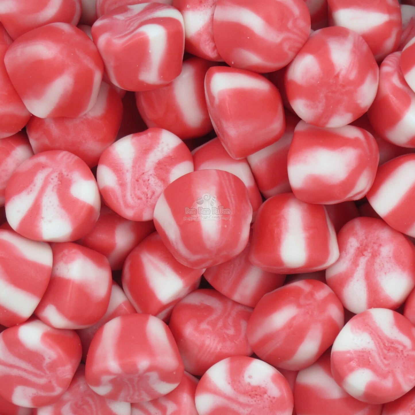 Close-up of red and white striped candies