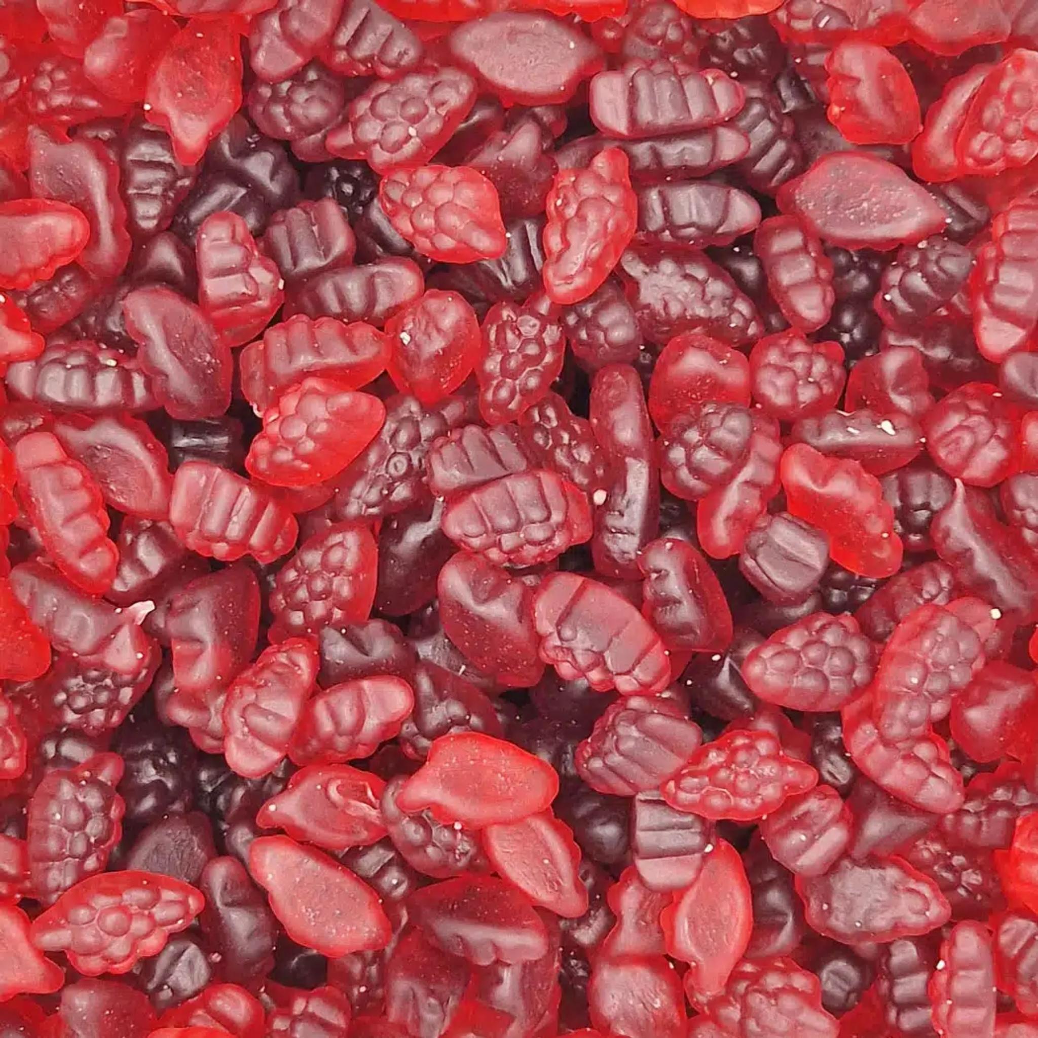 Close-up of red and black gummy candies.